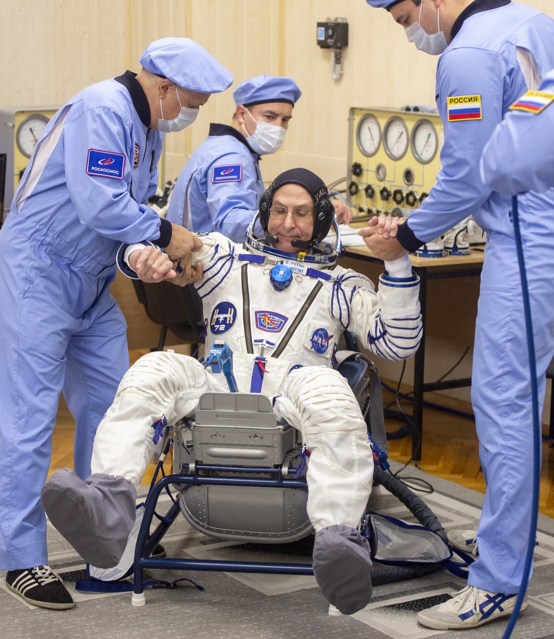 NASA astronaut Don Pettit has his Russian Sokol suit pressure checked as he and fellow crew mates, Roscosmos cosmonauts Alexey Ovchinin, and Ivan Vagner, prepare for their Soyuz launch to the International Space Station Wednesday, Sept. 11, 2024 in Baikonur, Kazakhstan. The launch will send Pettit, Ovchinin, and Vagner on a mission to the International Space Station. Photo Credit: (NASA/GCTC/Andrey Shelepin)