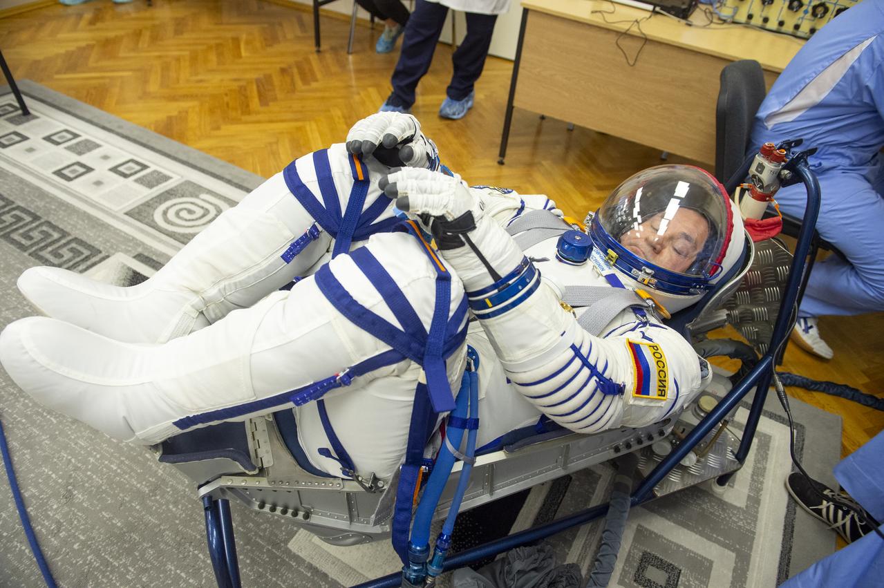 Roscosmos cosmonaut Alexey Ovchinin has his Russian Sokol suit pressure checked as he and fellow crew mates, Roscosmos cosmonaut Alexey Ovchinin, and NASA astronaut Don Pettit, prepare for their Soyuz launch to the International Space Station Wednesday, Sept. 11, 2024 in Baikonur, Kazakhstan. The launch will send Pettit, Ovchinin, and Vagner on a mission to the International Space Station. Photo Credit: (NASA/GCTC/Andrey Shelepin)