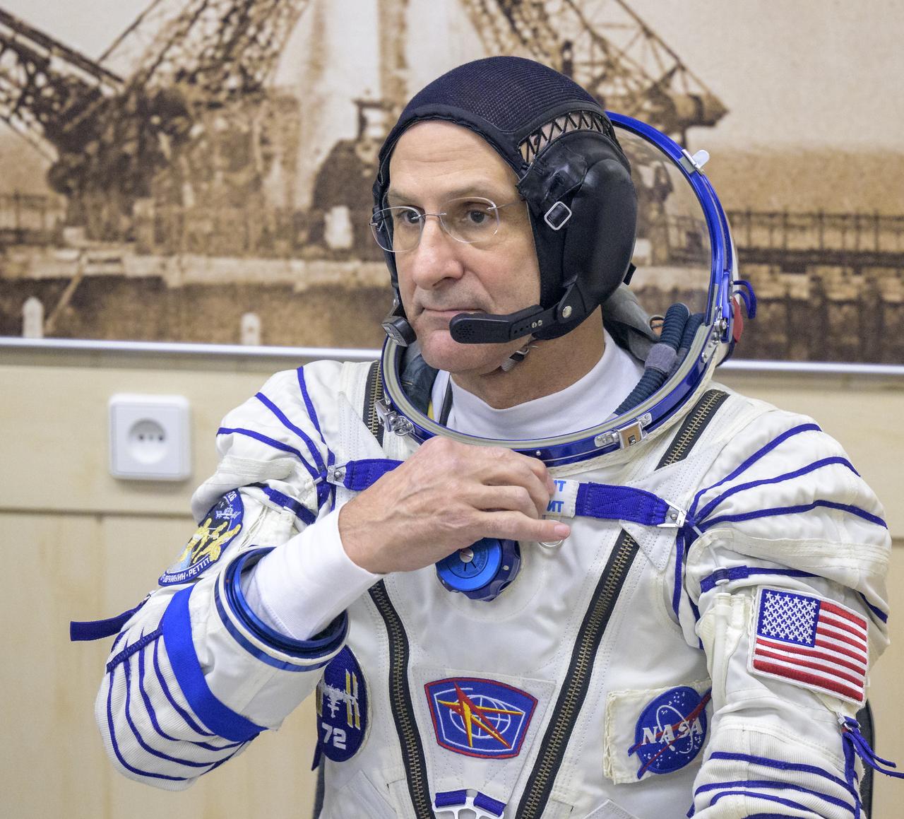 NASA astronaut Don Pettit waits to have his Russian Sokol suit pressure checked as he and fellow crew mates, Roscosmos cosmonauts Alexey Ovchinin, and Ivan Vagner, prepare for their Soyuz launch to the International Space Station Wednesday, Sept. 11, 2024 in Baikonur, Kazakhstan. The launch will send Pettit, Ovchinin, and Vagner on a mission to the International Space Station. Photo Credit: (NASA/Bill Ingalls)