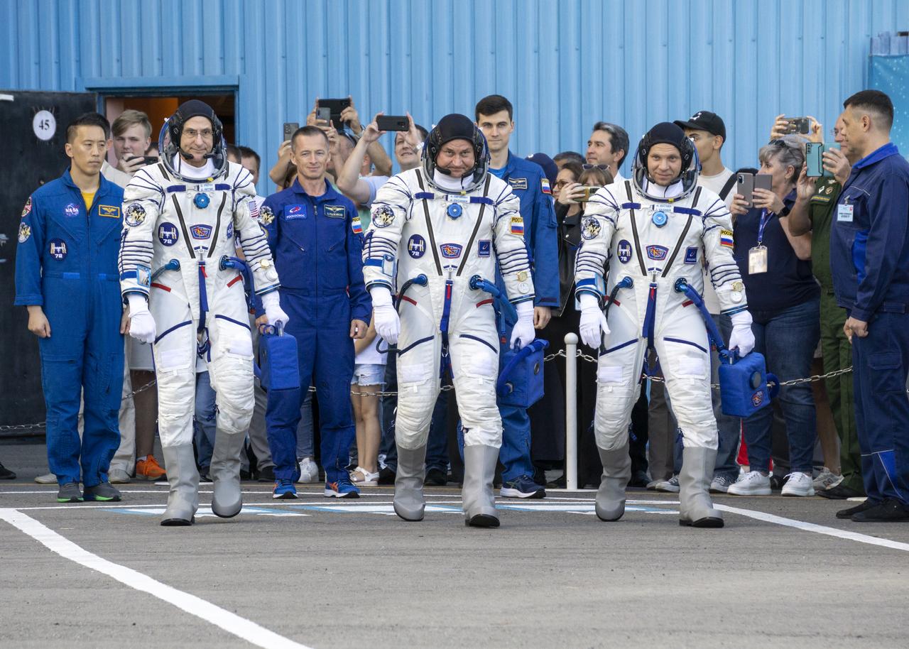 Expedition 72 crew members: NASA astronaut Don Pettit, left, Roscosmos cosmonauts Alexey Ovchinin, and Ivan Vagner,right, depart building 254 for their Soyuz launch to the International Space Station Wednesday, Sept. 11, 2024 in Baikonur, Kazakhstan. The launch will send Pettit, Ovchinin, and Vagner on a mission to the International Space Station. Photo Credit: (NASA/Victor Zelentsov)