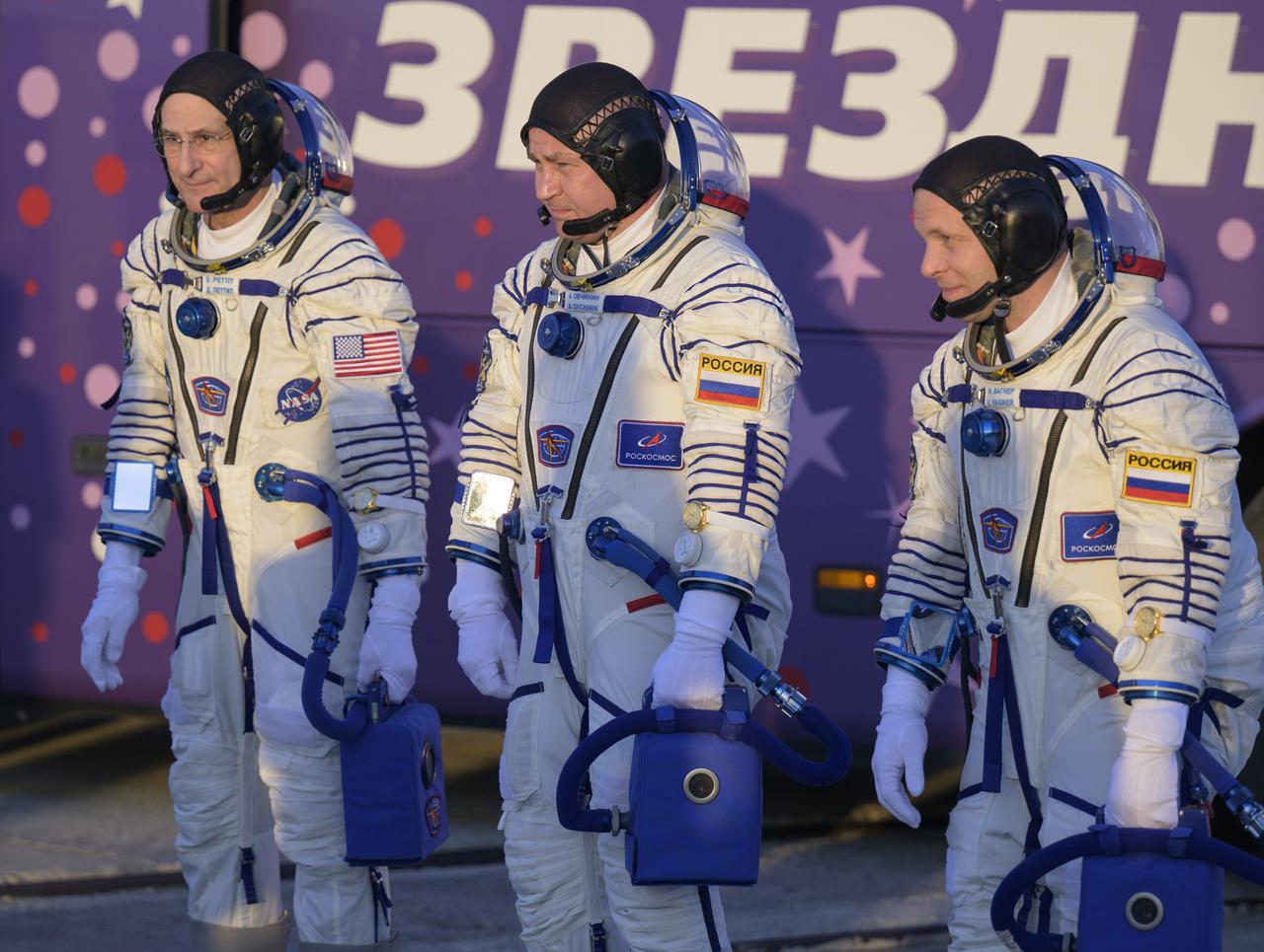 Expedition 72 crew members: NASA astronaut Don Pettit, left, and Roscosmos cosmonauts Alexey Ovchinin, and Ivan Vagner, right, meet with NASA and Roscosmos managers prior to boarding the Soyuz MS-26 spacecraft for launch, Wednesday, Sept. 11, 2024 at the Baikonur Cosmodrome in Kazakhstan. Launch of the Soyuz rocket will send the trio on a mission to the International Space Station. Photo Credit: (NASA/Bill Ingalls)