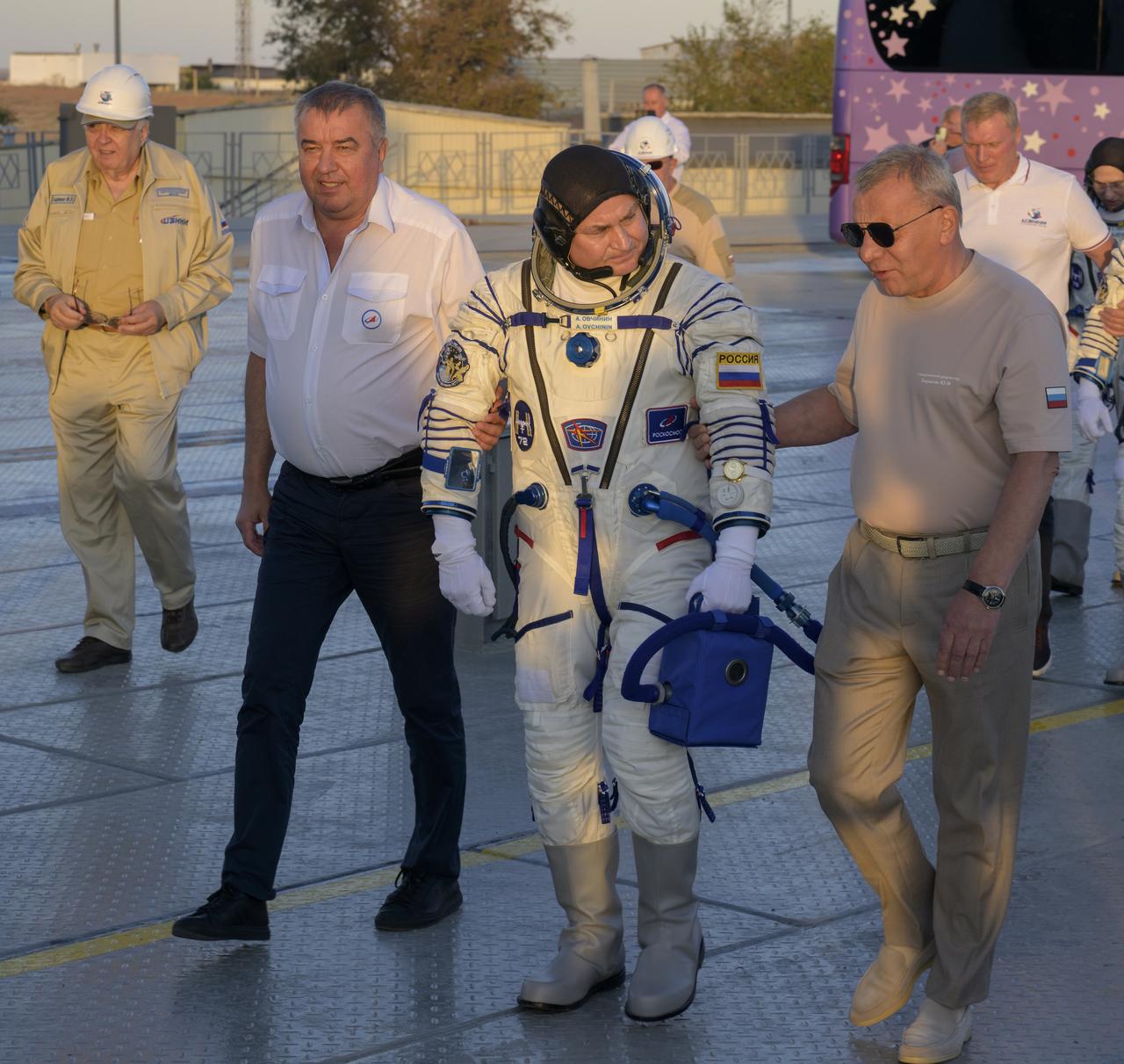 Roscosmos cosmonaut Alexey Ovchinin walks to the Soyuz rocket for boarding, Wednesday, Sept. 11, 2024 at the Baikonur Cosmodrome in Kazakhstan. The launch of Ovchinin along with Roscosmos cosmonaut Ivan Vagner and NASA astronaut Don Pettit will send the trio on a mission to the International Space Station. Photo Credit: (NASA/Bill Ingalls)