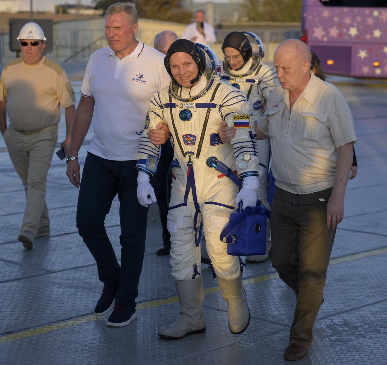 Roscosmos cosmonaut Ivan Vagner walks to the Soyuz rocket for boarding, Wednesday, Sept. 11, 2024 at the Baikonur Cosmodrome in Kazakhstan. The launch of Vagner along with Roscosmos cosmonaut Alexey Ovchinin and NASA astronaut Don Pettit will send the trio on a mission to the International Space Station. Photo Credit: (NASA/Bill Ingalls)