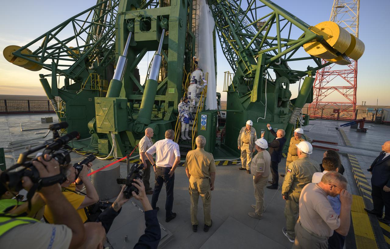 Expedition 72 crew members: Roscosmos cosmonaut Ivan Vagner, top, NASA astronaut Don Pettit, middle, and Roscosmos cosmonaut Alexey Ovchinin, board the Soyuz MS-26 spacecraft for launch, Wednesday, Sept. 11, 2024 at the Baikonur Cosmodrome in Kazakhstan. Launch of the Soyuz rocket will send the trio on a mission to the International Space Station. Photo Credit: (NASA/Bill Ingalls)