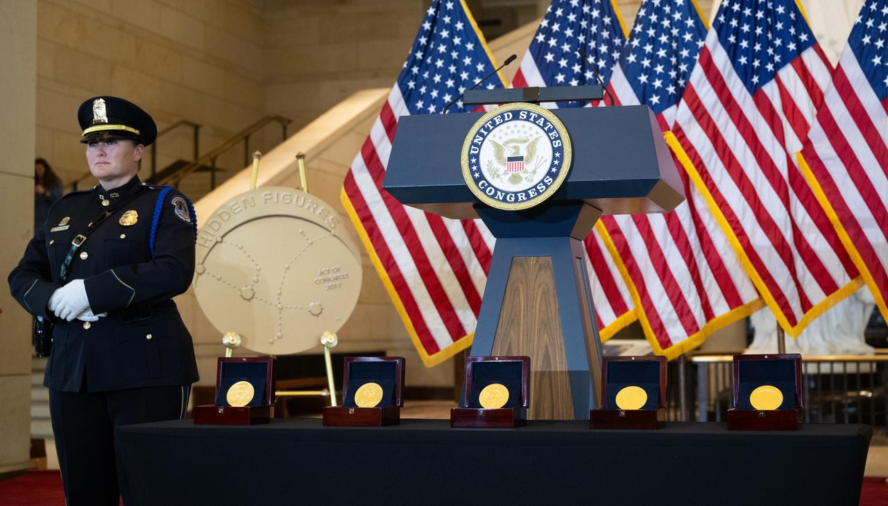 The Congressional Gold Medals to be presented are seen before the start of a ceremony recognizing NASA’s Hidden Figures, Wednesday, Sept. 18, 2024, in Emancipation Hall at the U.S. Capitol in Washington. Congressional Gold Medals were awarded to Katherine Johnson, Dr. Christine Darden, Dorothy Vaughan, and Mary W. Jackson in recognition of their service to the United States as well as a Congressional Gold Medal in recognition of all the women who served as computers, mathematicians, and engineers at the National Advisory Committee for Aeronautics and NASA between the 1930s and 1970s.  Photo Credit: (NASA/Joel Kowsky)