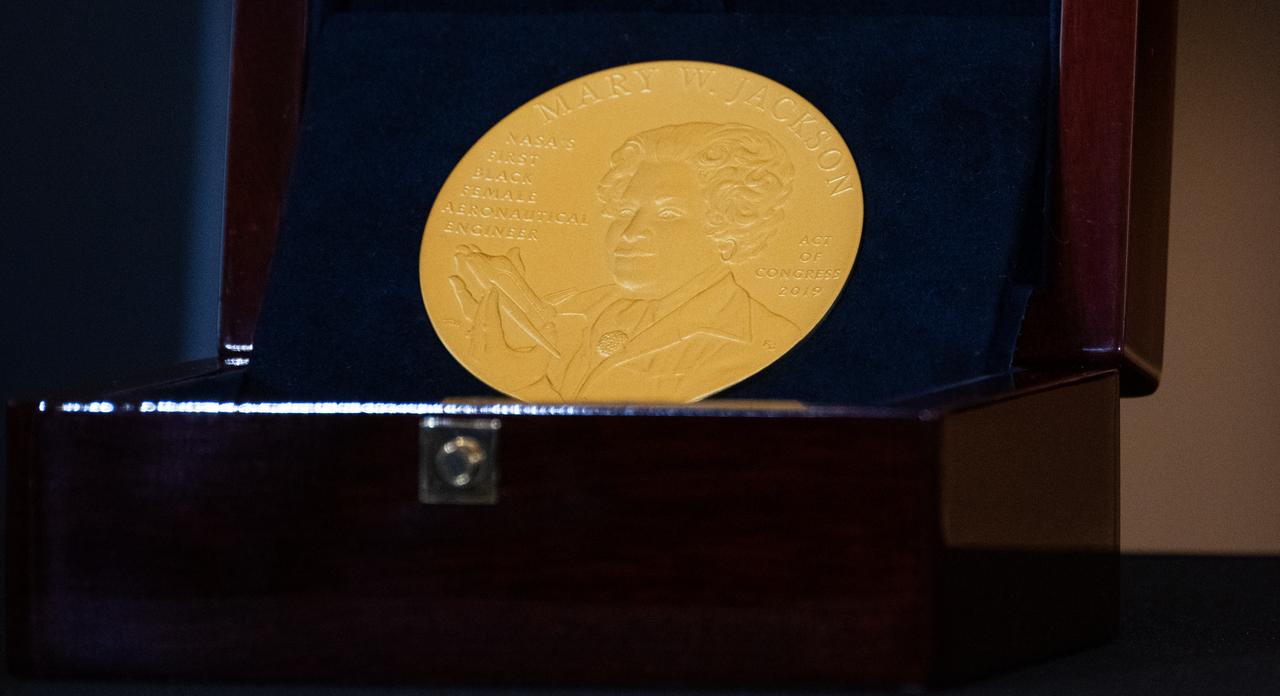 The Congressional Gold Medal in commemoration of Mary W. Jackson for her service to the United States during the space race is seen during a ceremony recognizing NASA’s Hidden Figures, Wednesday, Sept. 18, 2024, in Emancipation Hall at the U.S. Capitol in Washington. Congressional Gold Medals were awarded to Katherine Johnson, Dr. Christine Darden, Dorothy Vaughan, and Mary W. Jackson in recognition of their service to the United States as well as a Congressional Gold Medal in recognition of all the women who served as computers, mathematicians, and engineers at the National Advisory Committee for Aeronautics and NASA between the 1930s and 1970s.  Photo Credit: (NASA/Joel Kowsky)
