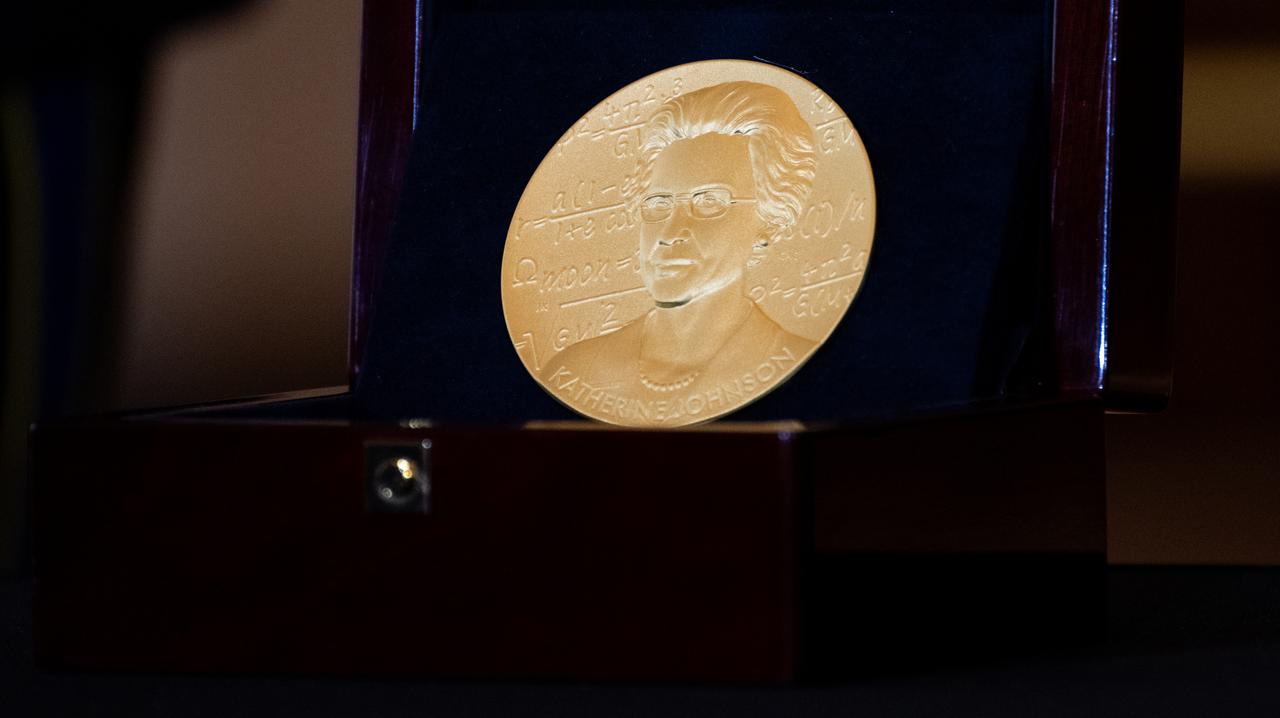 The Congressional Gold Medal in recognition of Katherine Johnson in recognition of her service to the United States as a Mathematician is seen during a ceremony recognizing NASA’s Hidden Figures, Wednesday, Sept. 18, 2024, in Emancipation Hall at the U.S. Capitol in Washington. Congressional Gold Medals were awarded to Katherine Johnson, Dr. Christine Darden, Dorothy Vaughan, and Mary W. Jackson in recognition of their service to the United States as well as a Congressional Gold Medal in recognition of all the women who served as computers, mathematicians, and engineers at the National Advisory Committee for Aeronautics and NASA between the 1930s and 1970s.  Photo Credit: (NASA/Joel Kowsky)