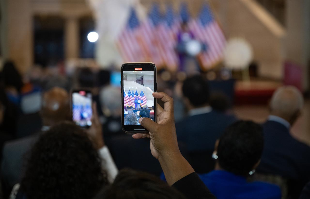 A member of the audience films Audra McDonald as she sings “America the Beautiful” during a Congressional Gold Medal ceremony recognizing NASA’s Hidden Figures, Wednesday, Sept. 18, 2024, in Emancipation Hall at the U.S. Capitol in Washington. Congressional Gold Medals were awarded to Katherine Johnson, Dr. Christine Darden, Dorothy Vaughan, and Mary W. Jackson in recognition of their service to the United States as well as a Congressional Gold Medal in recognition of all the women who served as computers, mathematicians, and engineers at the National Advisory Committee for Aeronautics and NASA between the 1930s and 1970s.  Photo Credit: (NASA/Joel Kowsky)