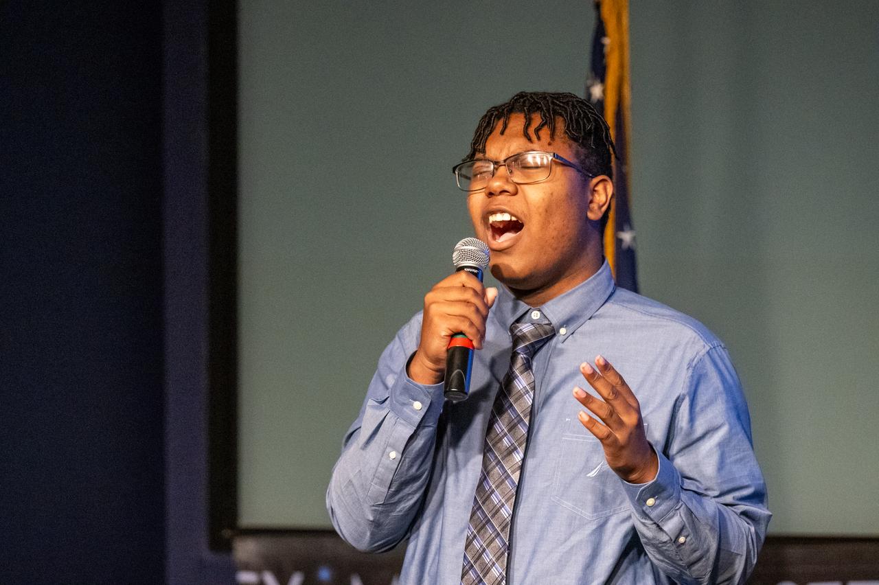 Soloist Craig Martin performs an anthem during a 5th Annual Hidden Figures Street Naming Anniversary event Thursday, Sept. 19, 2024, at the Mary W. Jackson NASA Headquarters building in Washington. Photo Credit: (NASA/Keegan Barber)