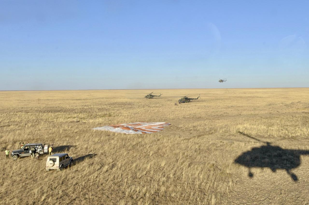 Russian Search and Rescue teams arrive at the Soyuz MS-25 spacecraft shortly after it landed in a remote area near the town of Zhezkazgan, Kazakhstan with Expedition 71 NASA astronaut Tracy C. Dyson, and Roscosmos cosmonauts Nikolai Chub and Oleg Kononenko, Monday, Sept. 23, 2024. Dyson is returning to Earth after logging 184 days in space as a member of Expeditions 70-71 aboard the International Space Station and Chub and Kononenko return after having spent the last 374 days in space. Photo Credit: (NASA/GCTC/Pavel Shvets)