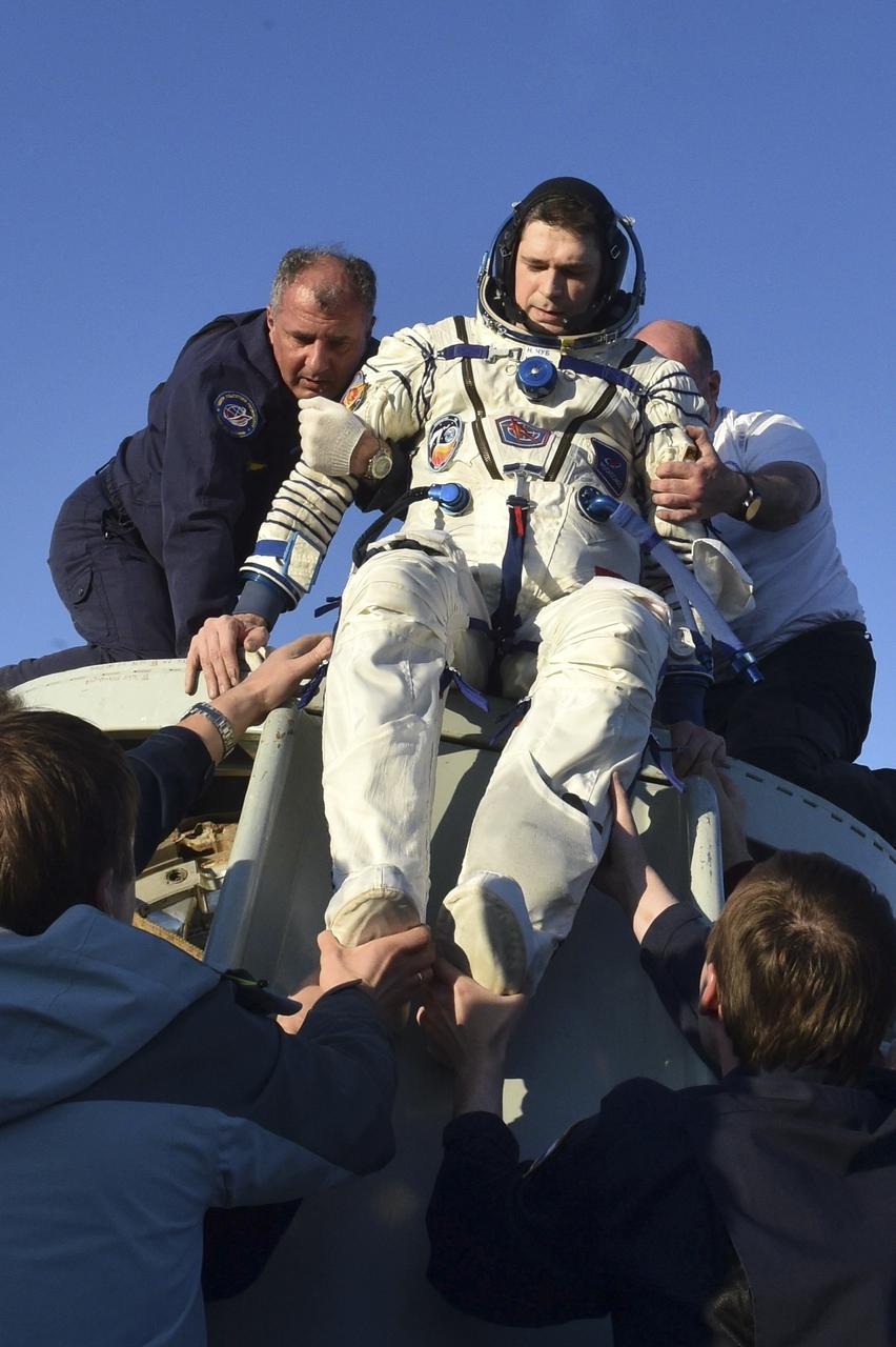 Roscosmos cosmonaut Nikolai Chub is helped out of the Soyuz MS-25 spacecraft just minutes after he, Roscosmos cosmonaut Oleg Kononenko, and NASA astronaut Tracy C. Dyson, landed in a remote area near the town of Zhezkazgan, Kazakhstan on Monday, Sept. 23, 2024. Dyson is returning to Earth after logging 184 days in space as a member of Expeditions 70-71 aboard the International Space Station and Chub and Kononenko return after having spent the last 374 days in space. Photo Credit NASA/GCTC/Pavel Shvets
