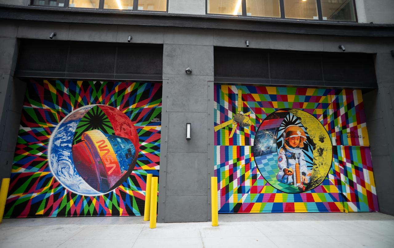 The inaugural murals for the relaunched NASA Art Program appear side-by-side at 350 Hudson Street, Monday, Sept. 23, 2024, in New York City. The murals, titled “To the Moon, and Back,” were created by New York-based artist team Geraluz and WERC and use geometrical patterns to invite deeper reflection on the exploration, creativity, and connection with the cosmos. Photo Credit: (NASA/Joel Kowsky)