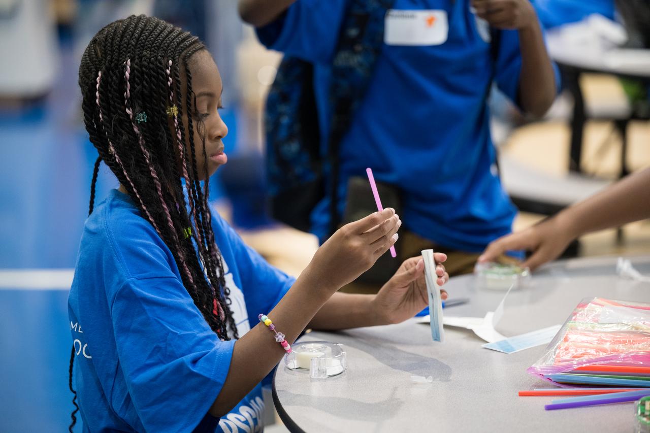 Students at Wheatley Education Campus participate in an activity to build their own rocket launcher during a kickoff event for the 21st Century Community Learning Centers NASA and Department of Education partnership, Monday, Sept. 23, 2024 at Wheatley Education Campus in Washington. Photo Credit: (NASA/Aubrey Gemignani)