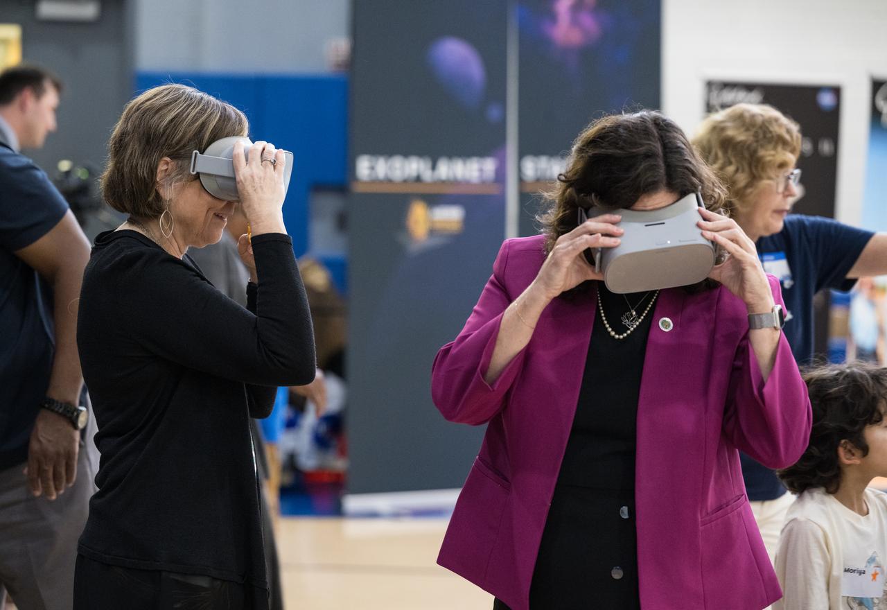 NASA Deputy Associate Administrator for NASA’s Office of STEM Engagement, Kris Brown, left, and U.S. Department of Education Deputy Secretary Cindy Marten, right, participate in a virtual reality tour of NASA’s Neutral Buoyancy Lab during a kickoff event for the 21st Century Community Learning Centers NASA and Department of Education partnership, Monday, Sept. 23, 2024 at Wheatley Education Campus in Washington. Photo Credit: (NASA/Aubrey Gemignani)