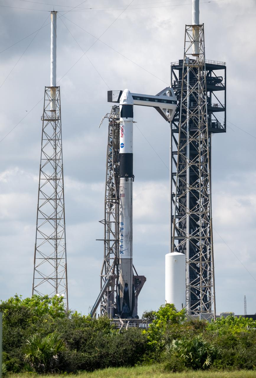 A SpaceX Falcon 9 rocket with the company's Dragon spacecraft on top is seen on the launch pad at Space Launch Complex 40 as preparations continue for the Crew-9 mission, Tuesday, Sept. 24, 2024, at Cape Canaveral Space Force Station in Florida. NASA’s SpaceX Crew-9 mission is the ninth crew rotation mission of the SpaceX Dragon spacecraft and Falcon 9 rocket to the International Space Station as part of the agency’s Commercial Crew Program. Photo Credit: (NASA/Keegan Barber)