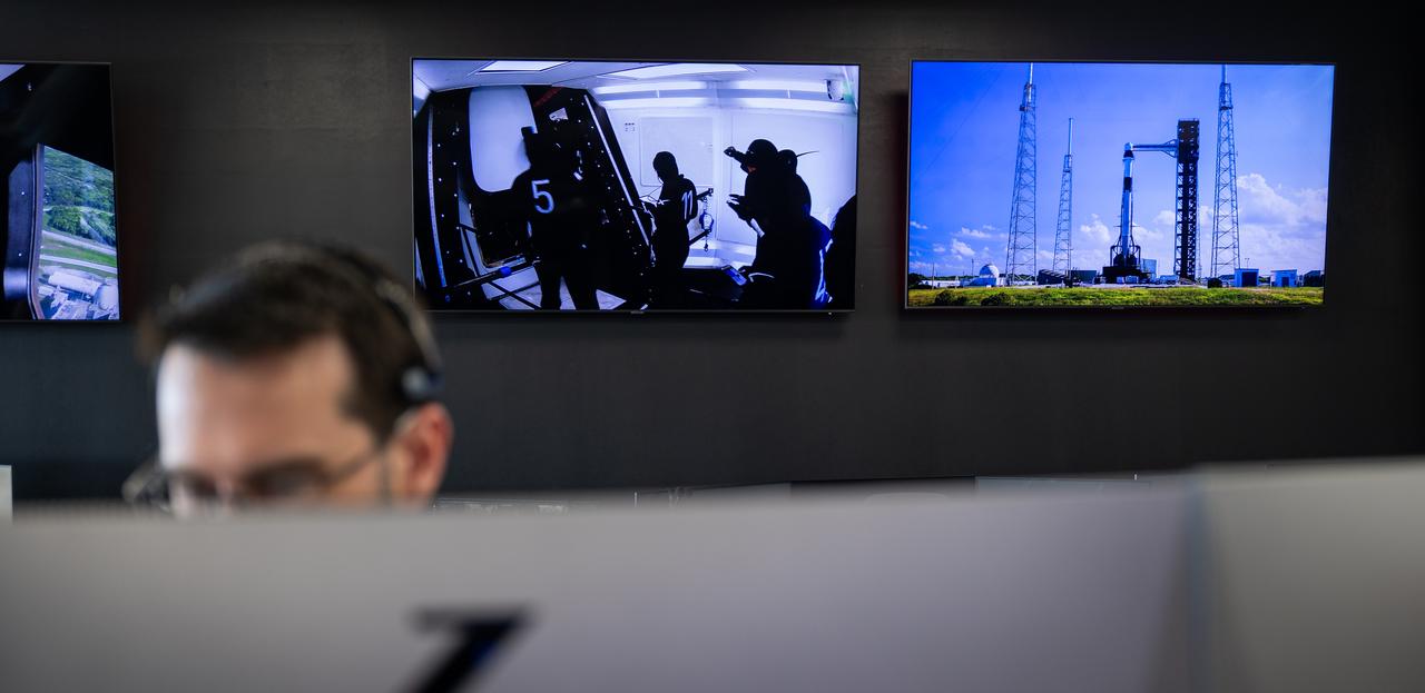 Live video feeds are seen as staff monitor the countdown during a dress rehearsal in preparation for the launch of a SpaceX Falcon 9 rocket carrying the company's Dragon spacecraft on NASA’s SpaceX Crew-9 mission with NASA astronaut Nick Hague and Roscosmos cosmonaut Aleksandr Gorbunov onboard, Tuesday, Sept. 24, 2024, in the control room of SpaceX’s HangarX at NASA’s Kennedy Space Center in Florida. NASA’s SpaceX Crew-9 mission is the ninth crew rotation mission of the SpaceX Dragon spacecraft and Falcon 9 rocket to the International Space Station as part of the agency’s Commercial Crew Program. Photo Credit: (NASA/Keegan Barber)