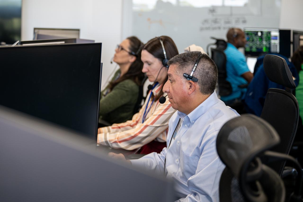 Richard Jones, manager of the Mission Management and Integration Office for NASA's Commercial Crew Program, right, monitors the countdown during a dress rehearsal in preparation for the launch of a SpaceX Falcon 9 rocket carrying the company's Dragon spacecraft on NASA’s SpaceX Crew-9 mission with NASA astronaut Nick Hague and Roscosmos cosmonaut Aleksandr Gorbunov onboard, Tuesday, Sept. 24, 2024, in the control room of SpaceX’s HangarX at NASA’s Kennedy Space Center in Florida. NASA’s SpaceX Crew-9 mission is the ninth crew rotation mission of the SpaceX Dragon spacecraft and Falcon 9 rocket to the International Space Station as part of the agency’s Commercial Crew Program. Photo Credit: (NASA/Keegan Barber)