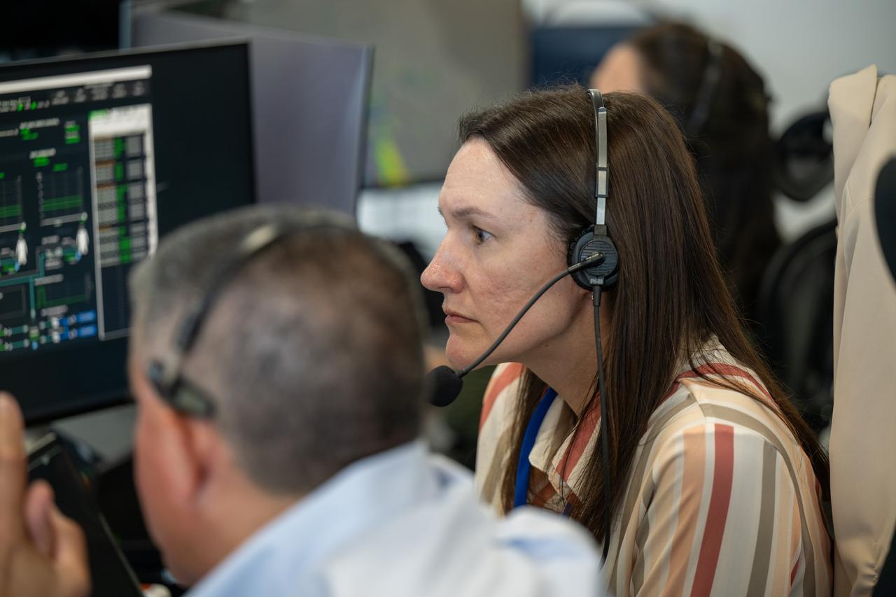 Nicole Jordan, manager of the Spacecraft Office for NASA's Commercial Crew Program, center, monitors the countdown during a dress rehearsal in preparation for the launch of a SpaceX Falcon 9 rocket carrying the company's Dragon spacecraft on NASA’s SpaceX Crew-9 mission with NASA astronaut Nick Hague and Roscosmos cosmonaut Aleksandr Gorbunov onboard, Tuesday, Sept. 24, 2024, in the control room of SpaceX’s HangarX at NASA’s Kennedy Space Center in Florida. NASA’s SpaceX Crew-9 mission is the ninth crew rotation mission of the SpaceX Dragon spacecraft and Falcon 9 rocket to the International Space Station as part of the agency’s Commercial Crew Program. Photo Credit: (NASA/Keegan Barber)