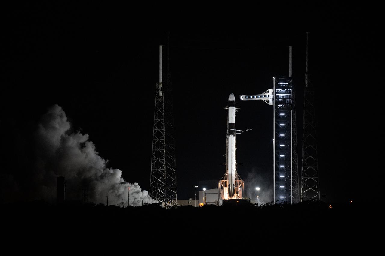 A SpaceX Falcon 9 rocket with the company's Dragon spacecraft onboard is seen on the launch pad at Space Launch Complex 40 during a brief static fire test ahead of NASA’s SpaceX Crew-9 mission, Tuesday, Sept. 24, 2024, at the Cape Canaveral Space Force Station in Florida. NASA’s SpaceX Crew-9 mission is the ninth crew rotation mission of the SpaceX Dragon spacecraft and Falcon 9 rocket to the International Space Station as part of the agency’s Commercial Crew Program. Photo Credit: (NASA/Keegan Barber)