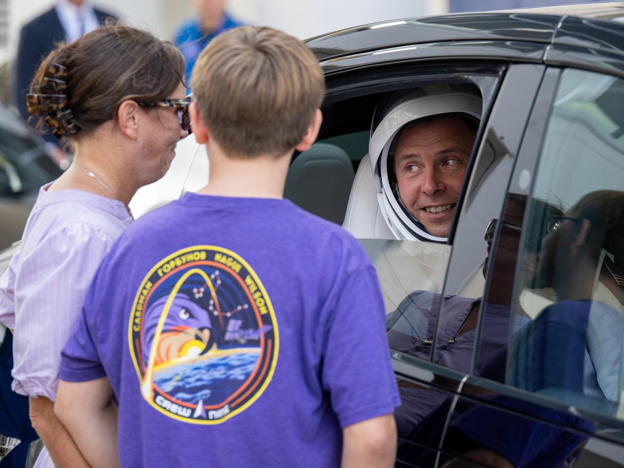 NASA astronaut Nick Hague speaks with family as he prepares to depart the Neil A. Armstrong Operations and Checkout Building for Space Launch Complex 40 on Cape Canaveral Space Force Station to board the SpaceX Dragon spacecraft for the Crew-9 mission launch, Saturday, Sept. 28, 2024, at NASA’s Kennedy Space Center in Florida. NASA’s SpaceX Crew-9 mission is the ninth crew rotation mission of the SpaceX Crew Dragon spacecraft and Falcon 9 rocket to the International Space Station as part of the agency’s Commercial Crew Program. Hague and Gorbunov are scheduled to launch at 1:17 p.m. EDT, from Space Launch Complex 40 at the Cape Canaveral Space Force Station.  Photo Credit: (NASA/Keegan Barber)