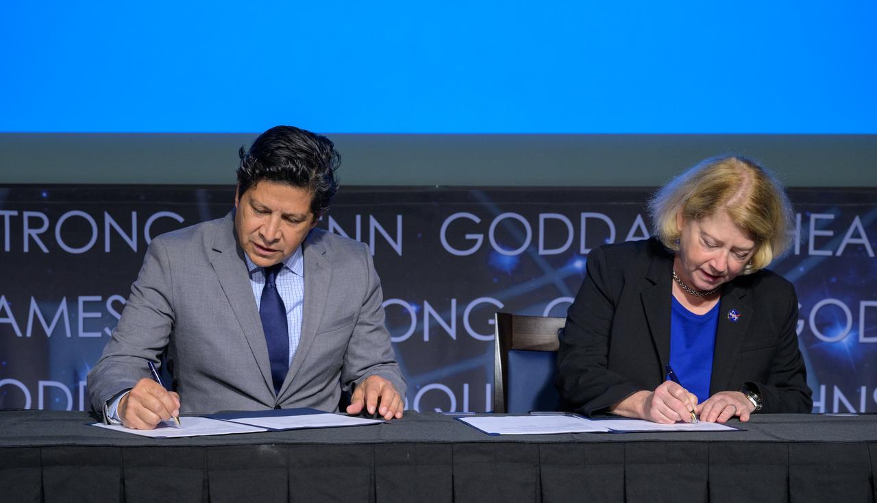 President and CEO of the Hispanic Heritage Foundation Jose Antonio Tijerino, left, and NASA Deputy Administrator Pam Melroy, sign a Space Act Agreement between the HHF and NASA to collaborate and expand STEM opportunities for Latino K-12 and university students and reduce barriers to agency activities and opportunities, Monday, Sept. 30, 2024, at the NASA Headquarters Mary W. Jackson Building in Washington. Photo Credit: (NASA/Bill Ingalls)