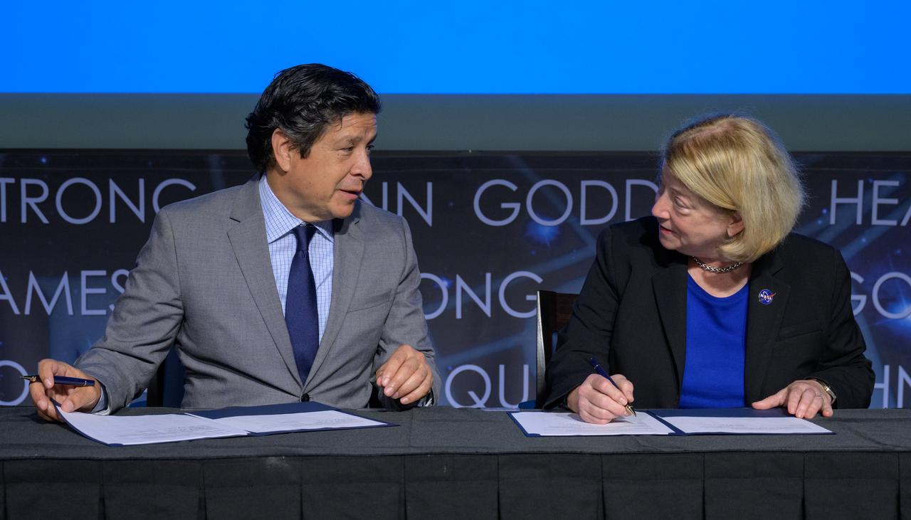 President and CEO of the Hispanic Heritage Foundation Jose Antonio Tijerino, left, and NASA Deputy Administrator Pam Melroy, sign a Space Act Agreement between the HHF and NASA to collaborate and expand STEM opportunities for Latino K-12 and university students and reduce barriers to agency activities and opportunities, Monday, Sept. 30, 2024, at the NASA Headquarters Mary W. Jackson Building in Washington. Photo Credit: (NASA/Bill Ingalls)