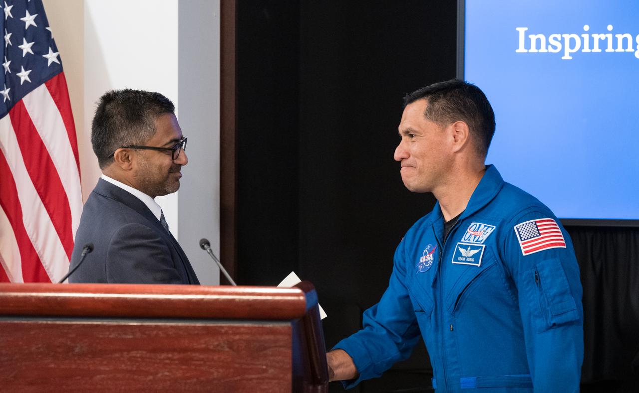 Chirag Parikh, Deputy Assistant to the President and Executive Secretary of the National Space Council, shakes hands with NASA astronaut Frank Rubio after reading a letter from U.S. Vice President Kamala Harris at the conclusion of a White House Hispanic Heritage month event titled “Soaring Together: Inspiring the Next Generation of Space Leaders” at the Eisenhower Executive Office Building, Monday, Sept. 30, 2024 in Washington. Photo Credit: (NASA/Aubrey Gemignani)