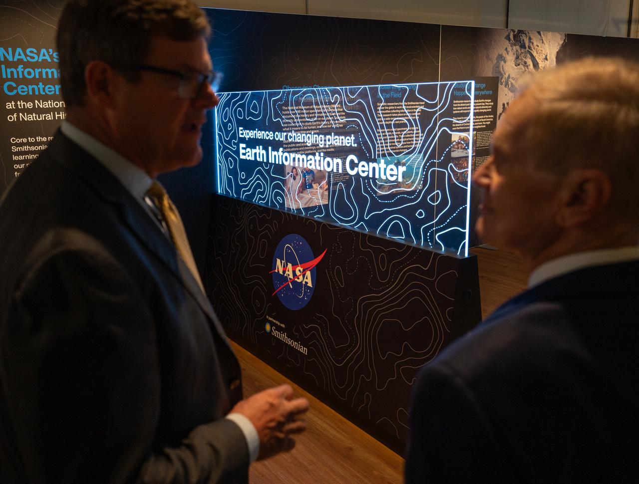 Smithsonian Museum of Natural History, Sant Director, Kirk Johnson, left, talks with NASA Administrator Bill Nelson, during a preview of the Earth Information Center at the Smithsonian National Museum of Natural History, in Washington, Monday, Oct. 7, 2024. The exhibit includes a video wall displaying Earth science data visualizations and videos, an interpretive panel showing Earth’s connected systems, information on our changing world, and an overview of how NASA and the Smithsonian study our home planet. Photo Credit: (NASA/Bill Ingalls)