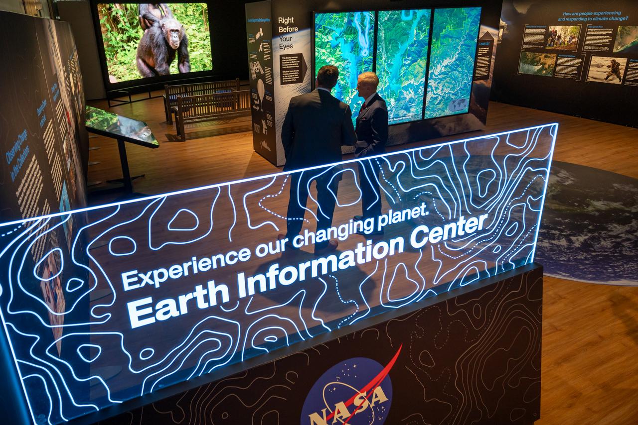 Smithsonian Museum of Natural History, Sant Director, Kirk Johnson, left, talks with NASA Administrator Bill Nelson, during a preview of the Earth Information Center at the Smithsonian National Museum of Natural History, in Washington, Monday, Oct. 7, 2024. The exhibit includes a video wall displaying Earth science data visualizations and videos, an interpretive panel showing Earth’s connected systems, information on our changing world, and an overview of how NASA and the Smithsonian study our home planet. Photo Credit: (NASA/Bill Ingalls)