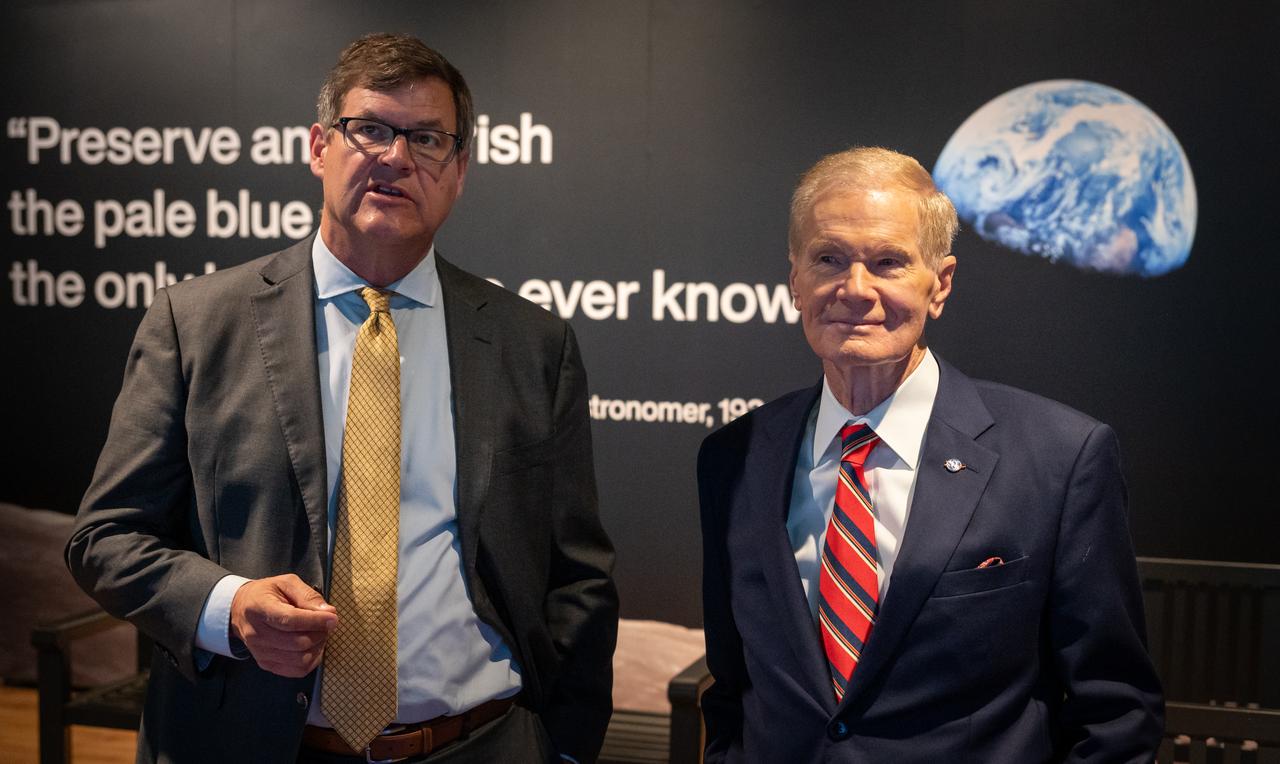 Smithsonian Museum of Natural History, Sant Director, Kirk Johnson, left, talks with NASA Administrator Bill Nelson, during a preview of the Earth Information Center at the Smithsonian National Museum of Natural History, in Washington, Monday, Oct. 7, 2024. The exhibit includes a video wall displaying Earth science data visualizations and videos, an interpretive panel showing Earth’s connected systems, information on our changing world, and an overview of how NASA and the Smithsonian study our home planet. Photo Credit: (NASA/Bill Ingalls)