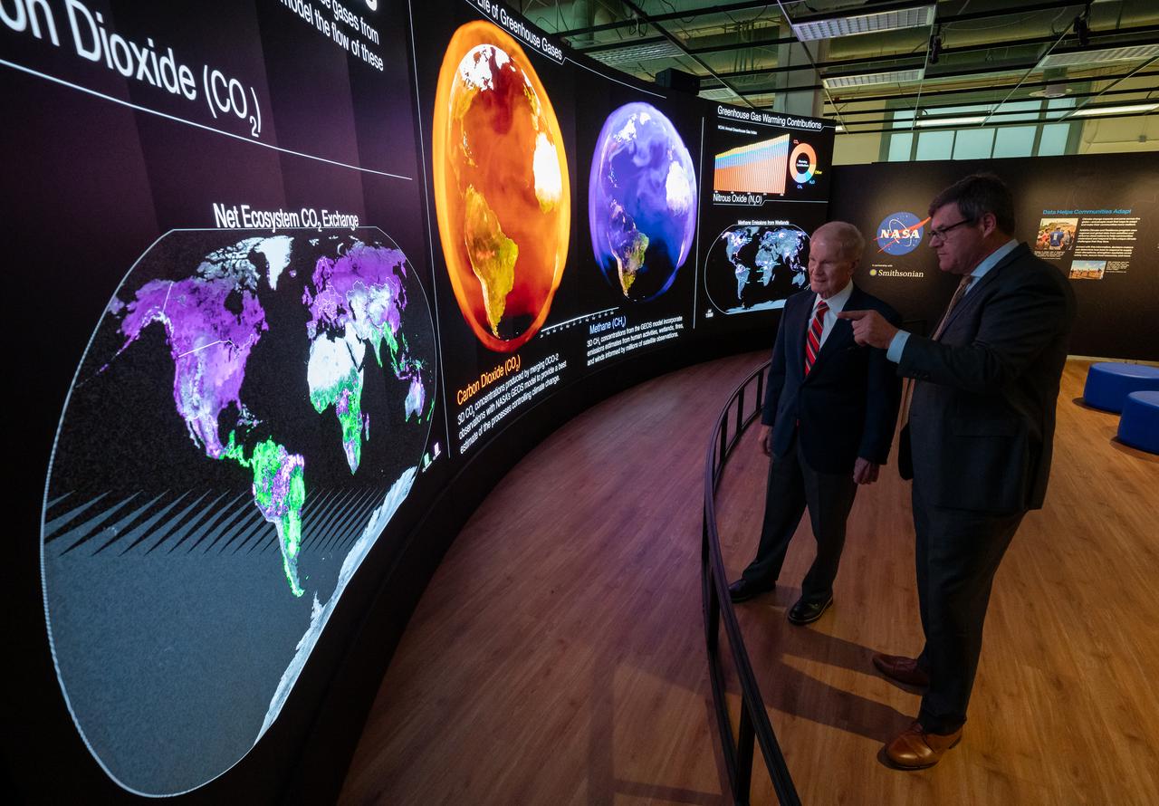 NASA Administrator Bill Nelson, left, and Smithsonian Museum of Natural History, Sant Director, Kirk Johnson, preview the Earth Information Center at the Smithsonian National Museum of Natural History, in Washington, Monday, Oct. 7, 2024. The exhibit includes a video wall displaying Earth science data visualizations and videos, an interpretive panel showing Earth’s connected systems, information on our changing world, and an overview of how NASA and the Smithsonian study our home planet. Photo Credit: (NASA/Bill Ingalls)
