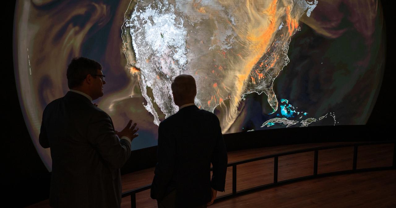 Smithsonian Museum of Natural History, Sant Director, Kirk Johnson, left, talks with NASA Administrator Bill Nelson, during a preview of the Earth Information Center at the Smithsonian National Museum of Natural History, in Washington, Monday, Oct. 7, 2024. The exhibit includes a video wall displaying Earth science data visualizations and videos, an interpretive panel showing Earth’s connected systems, information on our changing world, and an overview of how NASA and the Smithsonian study our home planet. Photo Credit: (NASA/Bill Ingalls)