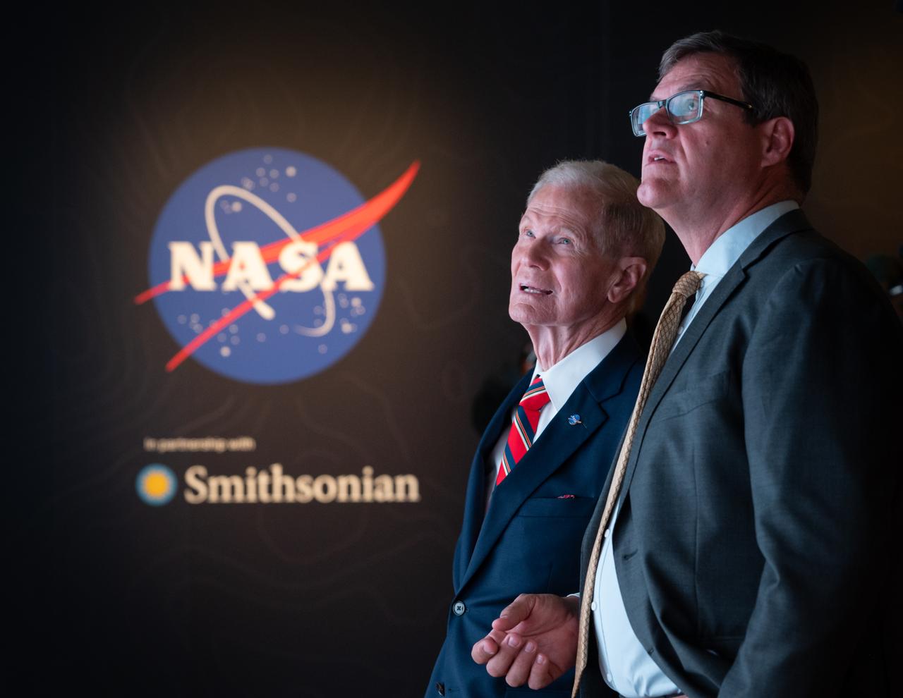 NASA Administrator Bill Nelson, left, and Smithsonian Museum of Natural History, Sant Director, Kirk Johnson, preview the Earth Information Center at the Smithsonian National Museum of Natural History, in Washington, Monday, Oct. 7, 2024. The exhibit includes a video wall displaying Earth science data visualizations and videos, an interpretive panel showing Earth’s connected systems, information on our changing world, and an overview of how NASA and the Smithsonian study our home planet. Photo Credit: (NASA/Bill Ingalls)