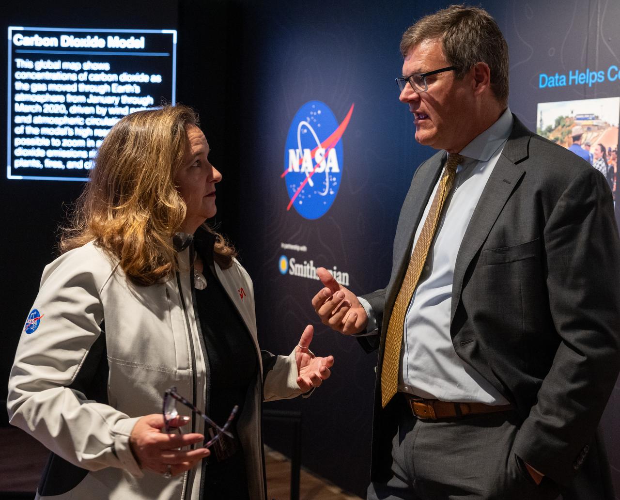 NASA Earth Sciences, Division Director, Karen St. Germain, left, and Smithsonian Museum of Natural History, Sant Director, Kirk Johnson, talk during a preview of the Earth Information Center at the Smithsonian National Museum of Natural History, in Washington, Monday, Oct. 7, 2024. The exhibit includes a video wall displaying Earth science data visualizations and videos, an interpretive panel showing Earth’s connected systems, information on our changing world, and an overview of how NASA and the Smithsonian study our home planet. Photo Credit: (NASA/Bill Ingalls)