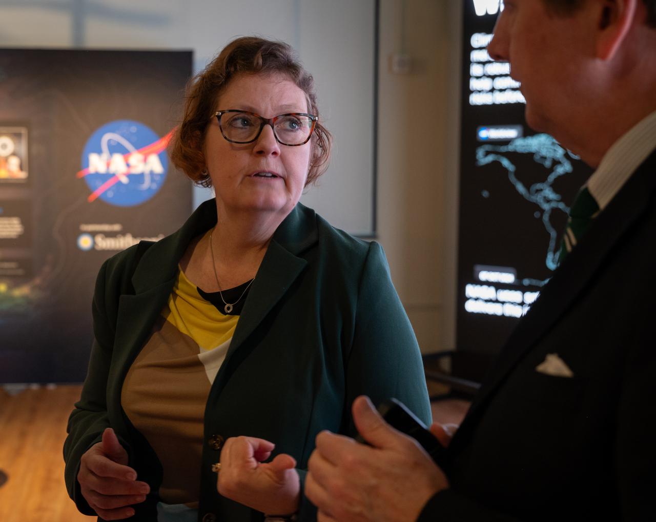 NASA Earth Sciences Division, Deputy Director, Julie Robinson, previews of the Earth Information Center at the Smithsonian National Museum of Natural History, in Washington, Monday, Oct. 7, 2024. The exhibit includes a video wall displaying Earth science data visualizations and videos, an interpretive panel showing Earth’s connected systems, information on our changing world, and an overview of how NASA and the Smithsonian study our home planet. Photo Credit: (NASA/Bill Ingalls)