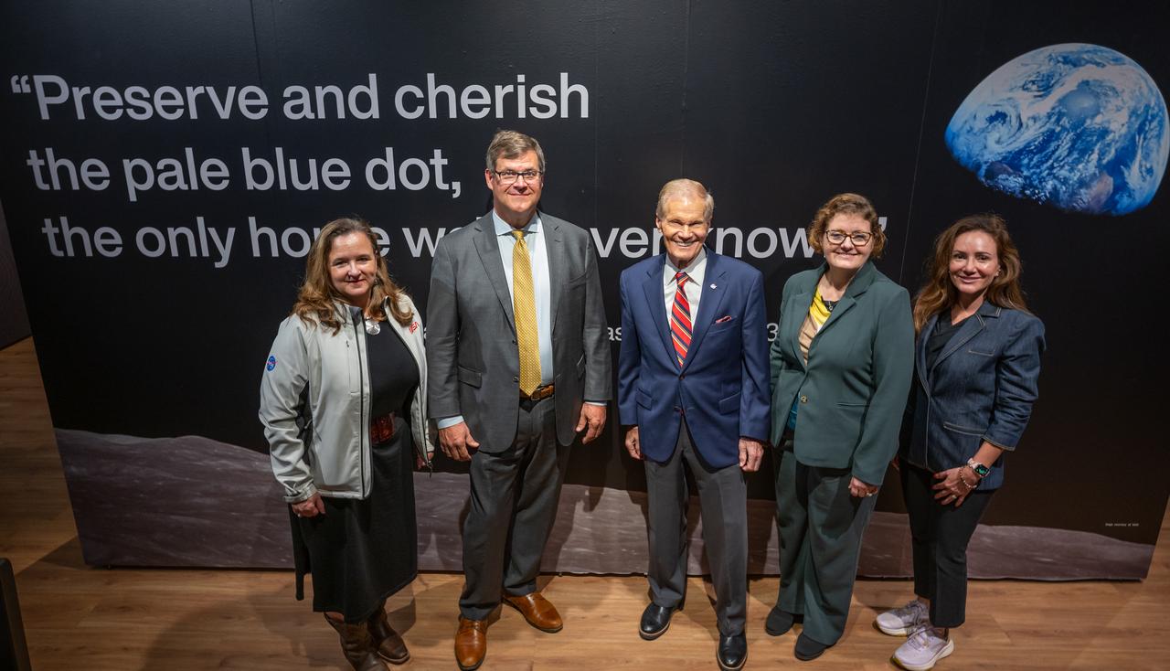 NASA Earth Sciences, Division Director, Karen St. Germain, left, Smithsonian Museum of Natural History, Sant Director, Kirk Johnson, NASA Administrator Bill Nelson, NASA Earth Sciences Division, Deputy Director, Julie Robinson, and NASA Senior Advisor Susie Perez Quinn, right, pose for a group photograph during a preview of the Earth Information Center at the Smithsonian National Museum of Natural History, in Washington, Monday, Oct. 7, 2024. The exhibit includes a video wall displaying Earth science data visualizations and videos, an interpretive panel showing Earth’s connected systems, information on our changing world, and an overview of how NASA and the Smithsonian study our home planet. Photo Credit: (NASA/Bill Ingalls)