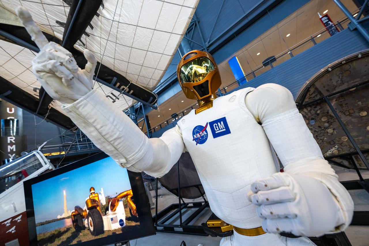 Robonaut 2 is seen at the Smithsonian National Air and Space Museum’s Steve F. Udvar-Hazy Center Thursday, Oct. 24, 2024, in Chantilly, Va. Robonaut 2, the first humanoid robot to fly to space, is displayed publicly for the first time near the space shuttle Discovery. Photo Credit: (NASA/Keegan Barber)