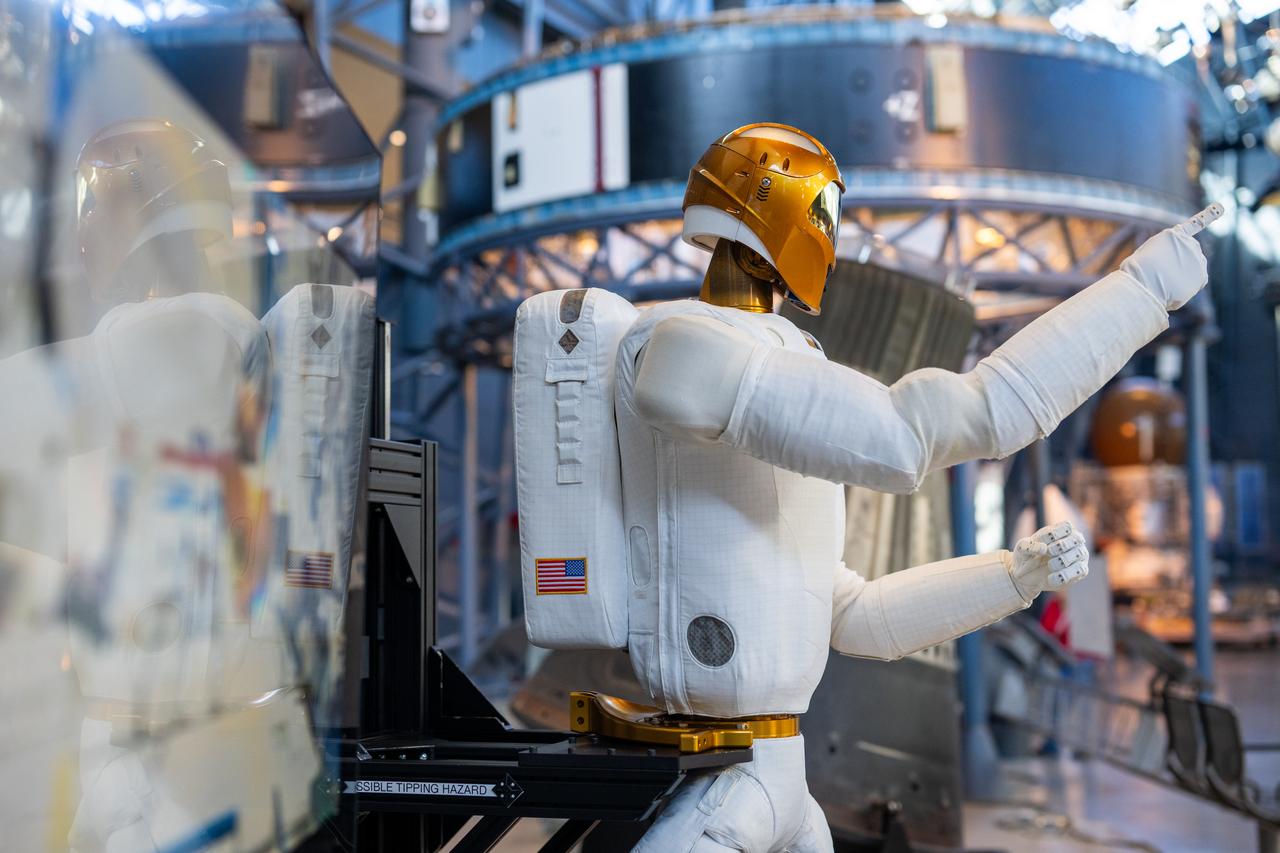 Robonaut 2 is seen at the Smithsonian National Air and Space Museum’s Steve F. Udvar-Hazy Center Thursday, Oct. 24, 2024, in Chantilly, Va. Robonaut 2, the first humanoid robot to fly to space, is displayed publicly for the first time near the space shuttle Discovery. Photo Credit: (NASA/Keegan Barber)