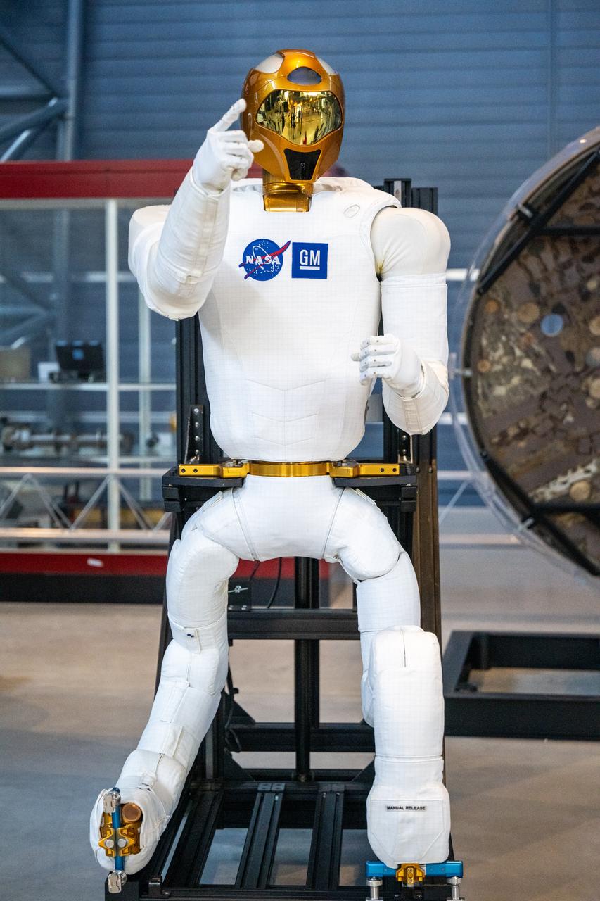 Robonaut 2 is seen at the Smithsonian National Air and Space Museum’s Steve F. Udvar-Hazy Center Thursday, Oct. 24, 2024, in Chantilly, Va. Robonaut 2, the first humanoid robot to fly to space, is displayed publicly for the first time near the space shuttle Discovery. Photo Credit: (NASA/Keegan Barber)