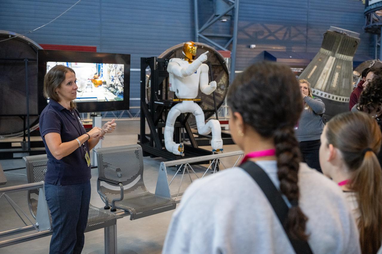 Julia Badger, autonomy and vehicle systems manager for Gateway at NASA’s Johnson Space Center and former Robonaut project manager, participates in a media opportunity at the Smithsonian National Air and Space Museum’s Steve F. Udvar-Hazy Center Thursday, Oct. 24, 2024, in Chantilly, Va. Robonaut 2, the first humanoid robot to fly to space, is displayed publicly for the first time near the space shuttle Discovery. Photo Credit: (NASA/Keegan Barber)