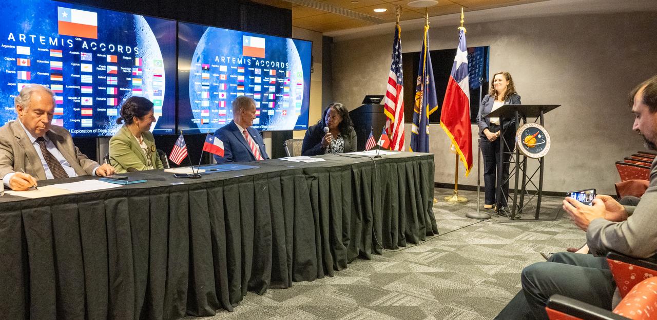 United States Department of State Acting Assistant Secretary in the Bureau of Oceans and International Environmental and Scientific Affairs Jennifer R. Littlejohn, right, delivers remarks during an Artemis Accords signing ceremony Friday, Oct. 25, 2024, at the Mary W. Jackson NASA Headquarters building in Washington. The Republic of Chile is the 47th country to sign the Artemis Accords, which establish a practical set of principles to guide space exploration cooperation among nations participating in NASA’s Artemis program. Photo Credit: (NASA/Keegan Barber)