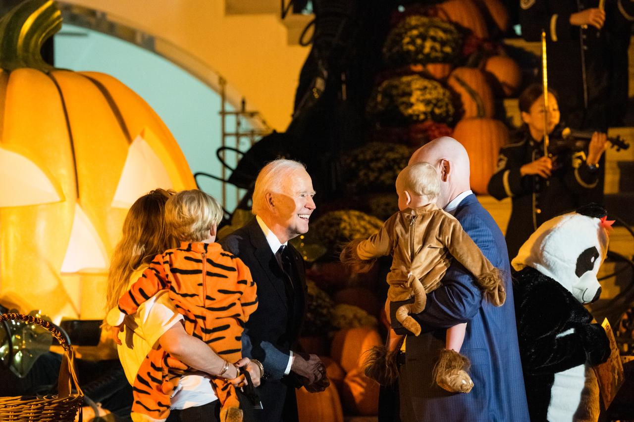 U.S. President Joe Biden and First Lady Jill Biden dressed in a panda costume, hand out candy at a White House Halloween themed event titled, “Hallo-READ!” on Wednesday, Oct. 30, 2024 on the south lawn of the White House in Washington. Photo Credit: (NASA/Aubrey Gemignani)
