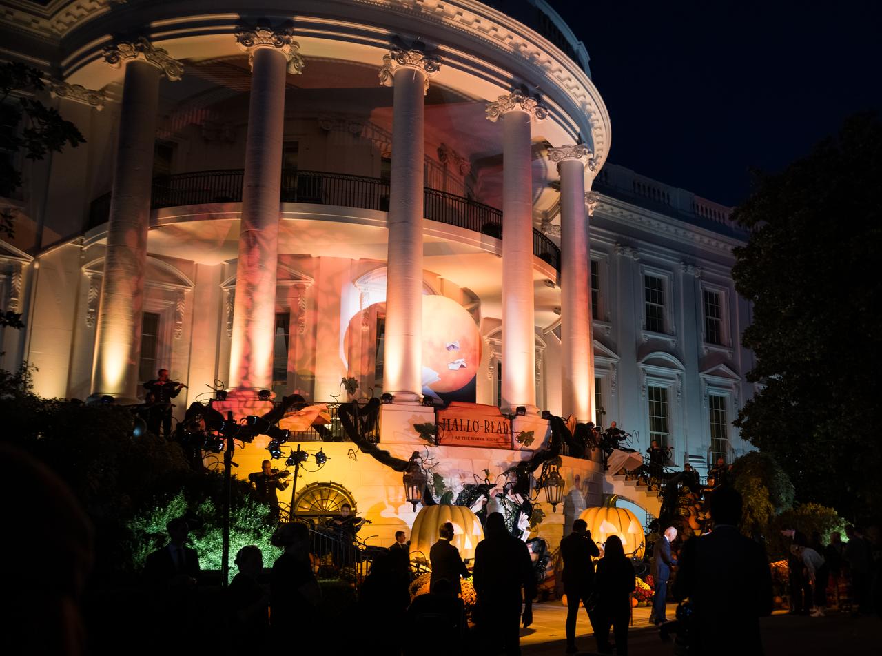U.S. President Joe Biden and First Lady Jill Biden dressed in a panda costume, hand out candy at a White House Halloween themed event titled, “Hallo-READ!” on Wednesday, Oct. 30, 2024 on the south lawn of the White House in Washington. Photo Credit: (NASA/Aubrey Gemignani)