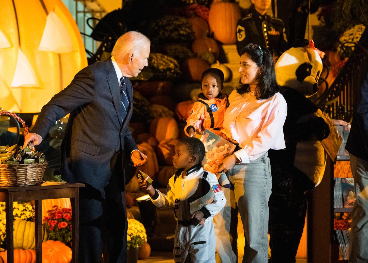U.S. President Joe Biden and First Lady Jill Biden dressed in a panda costume, hand out candy at a White House Halloween themed event titled, “Hallo-READ!” on Wednesday, Oct. 30, 2024 on the south lawn of the White House in Washington. Photo Credit: (NASA/Aubrey Gemignani)