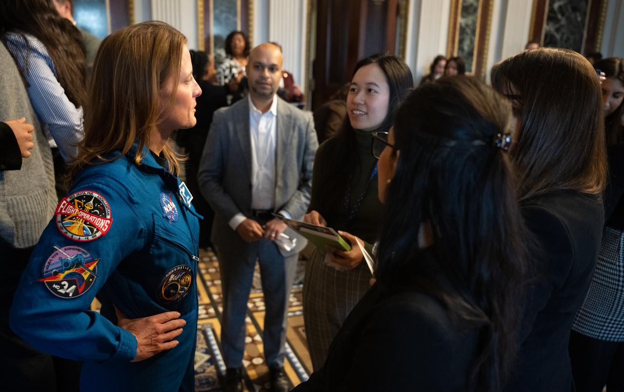 NASA astronaut Loral O’Hara speaks with attendees following a fireside chat, Wednesday, Dec. 4, 2024 at the Eisenhower Executive Office Building in Washington. O’Hara and fellow NASA astronaut Jasmin Moghbeli spent six months in space as part of Expedition 70 aboard the International Space Station.  Photo Credit: (NASA/Joel Kowsky)