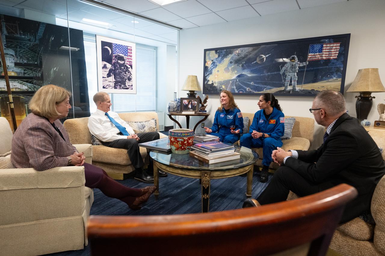 NASA astronauts Loral O’Hara, center, and Jasmin Moghbeli, second from right, meet with NASA Deputy Administrator Pam Melroy, left, and NASA Administrator Bill Nelson, second from left, and NASA Associate Administrator Jim Free, right, Wednesday, Dec. 4, 2024, at the Mary W. Jackson NASA Headquarters Building in Washington. O’Hara and Moghbeli spent six months in space as part of Expedition 70 aboard the International Space Station.  Photo Credit: (NASA/Joel Kowsky)