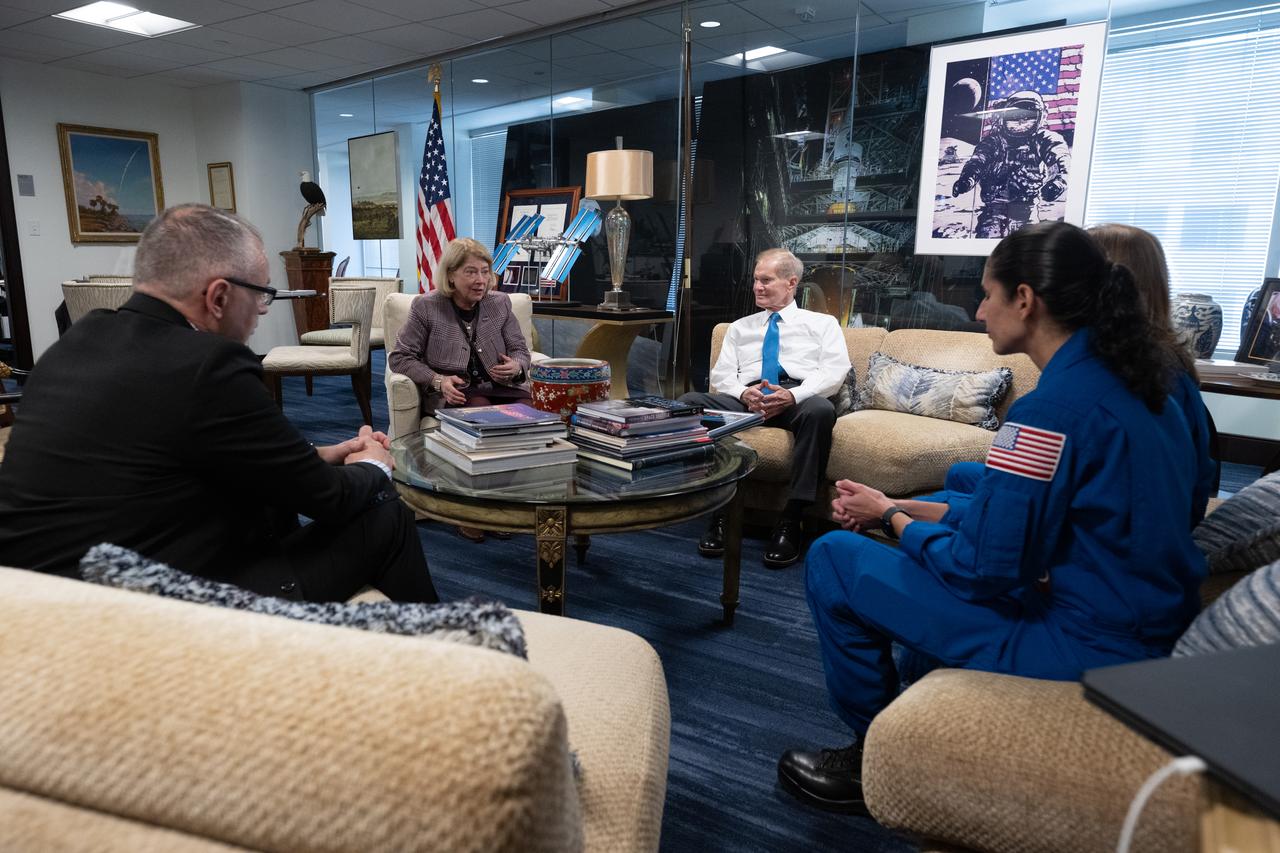 NASA Deputy Administrator Pam Melroy, second from left, speaks with NASA astronauts Jasmin Moghbeli and Loral O’Hara alongside NASA Administrator Bill Nelson and NASA Associate Administrator Jim Free, Wednesday, Dec. 4, 2024, at the Mary W. Jackson NASA Headquarters Building in Washington. O’Hara and Moghbeli spent six months in space as part of Expedition 70 aboard the International Space Station.  Photo Credit: (NASA/Joel Kowsky)