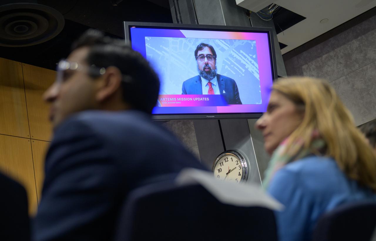 NASA Deputy Associate Administrator for the Moon to Mars Program in the Explorations Systems Development Mission Directorate, Amit Kshatriya, on the monitor, gives remarks during an update on NASA's Artemis campaign, Thursday, Dec. 5, 2024, at the NASA Headquarters Mary W. Jackson Building in Washington. Photo Credit: (NASA/Bill Ingalls)