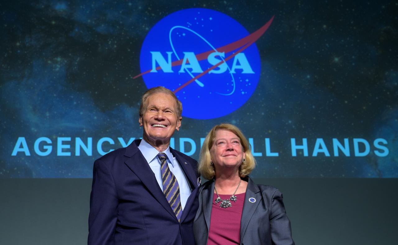 NASA Administrator Bill Nelson, and NASA Deputy Administrator Pam Melroy, react as they are recognized by employees during a NASA agencywide all hands, Friday, Dec. 6, 2024, at the NASA Headquarters Mary W. Jackson Building in Washington. Photo Credit: (NASA/Bill Ingalls)