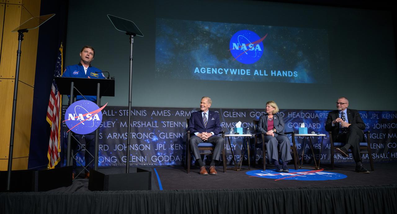 NASA Astronaut and Artemis II commander Reid Wiseman, gives remarks during a NASA agencywide all hands, as NASA Administrator Bill Nelson, NASA Deputy Administrator Pam Melroy, and, NASA Associate Administrator Jim Free, right, look on, Friday, Dec. 6, 2024, at the NASA Headquarters Mary W. Jackson Building in Washington. Photo Credit: (NASA/Bill Ingalls)